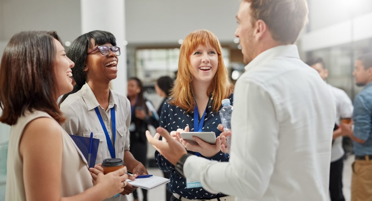 Cropped shot of a group of businesspeople having a conversation in an office